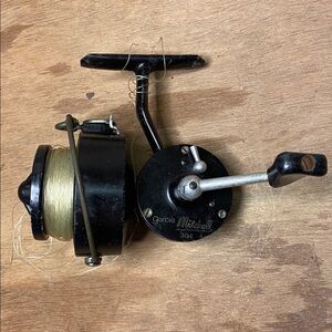 Vintage Mitchell Garcia Spin Fishing Reel 304 Fish open face. Working